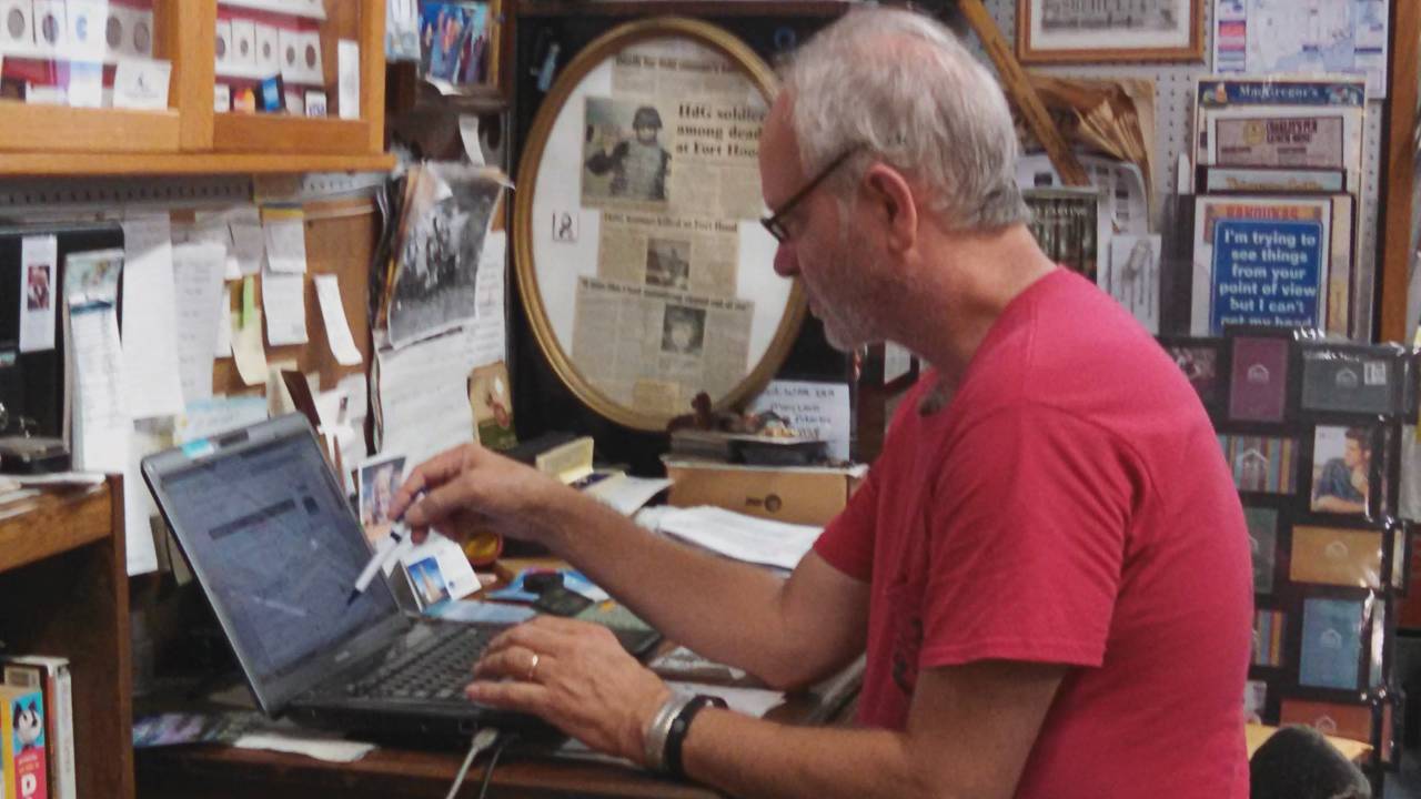 George - the casual historian - doing his research at Bahoukas Antiques in Havre de Grace