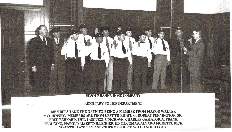 Photo of 1950s swearing-in of the Susquehanna Hose Co. Fire Police with then-Mayor Charlie McLhinney.