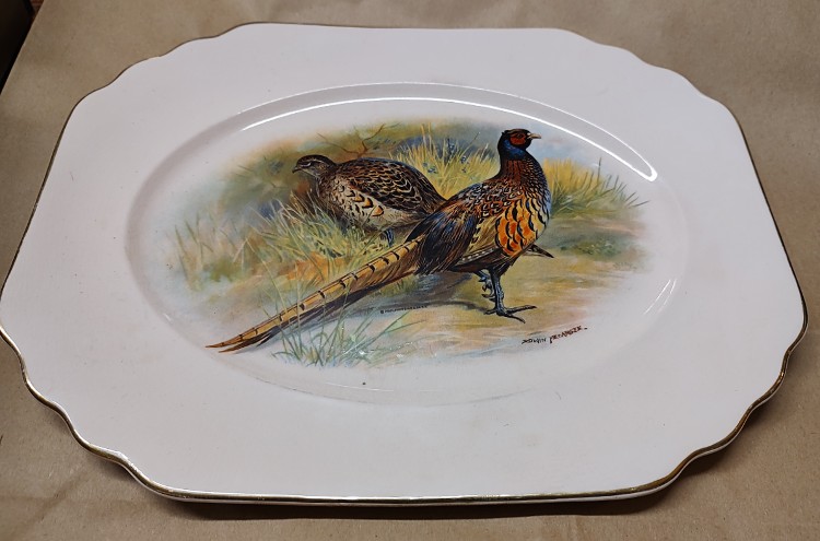 Pheasant painting on a Collector Plate compliments of Pitcock Bros of Havre de Grace