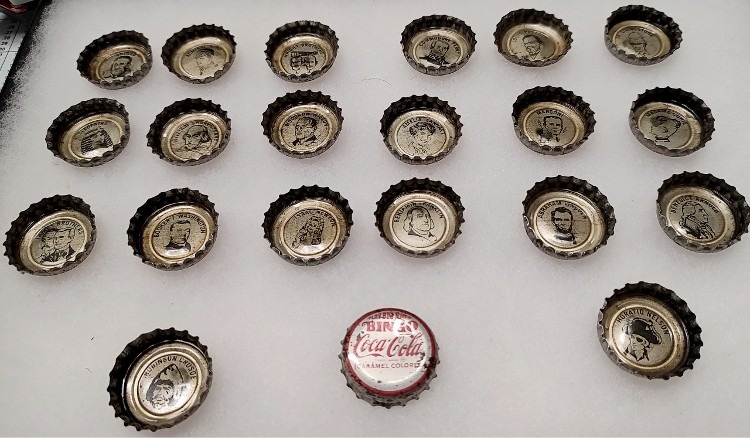 Coca-Cola bottlecaps with pics inside - part of a promotion Bingo game
