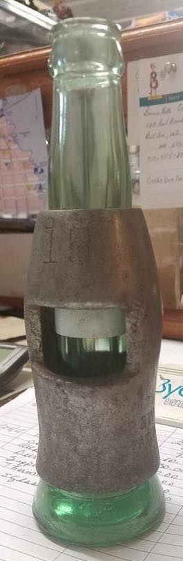 photo of a vintage Coca Cola test bottle
