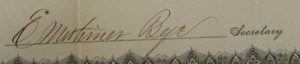 Signature of E. Mortimer Bye, Secretary on the bond created by Havre Iron Company 1899