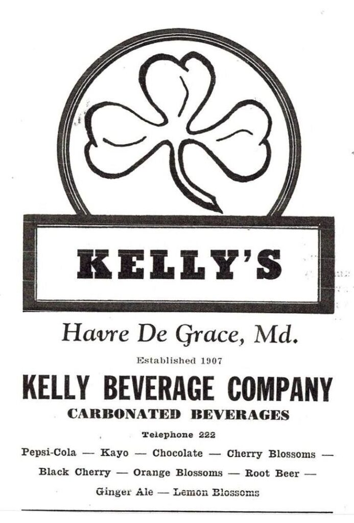 an advertisement in black and white for Kelly Beverage Company in Havre de Grace