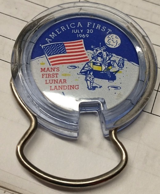 The other side of the keyring collectible from Leithiser's Men's Wear celebrating the 1969 moon landing!
