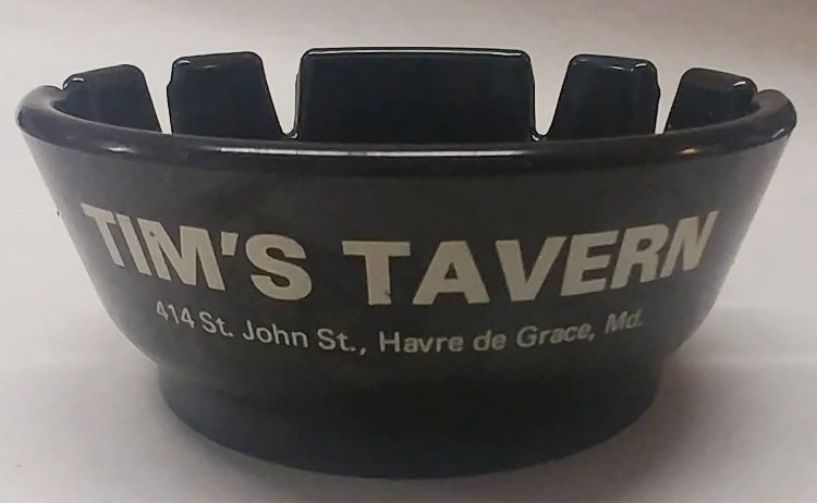 Vintage plastic black ashtray advertising Tim's Tavern in Havre de Grace, MD
