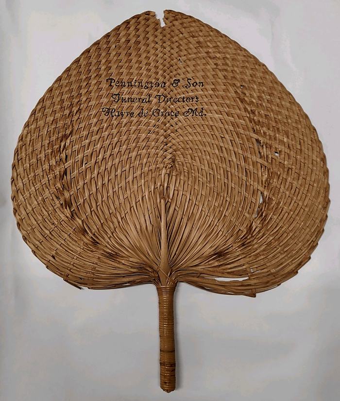 Palm-shaped fan from Pennington & Son Funeral Home in Havre de Grace