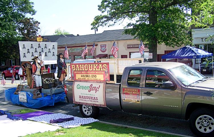 image of Bahoukas Antique Mall truck with GreenJoy and the Pirate Fest displays.