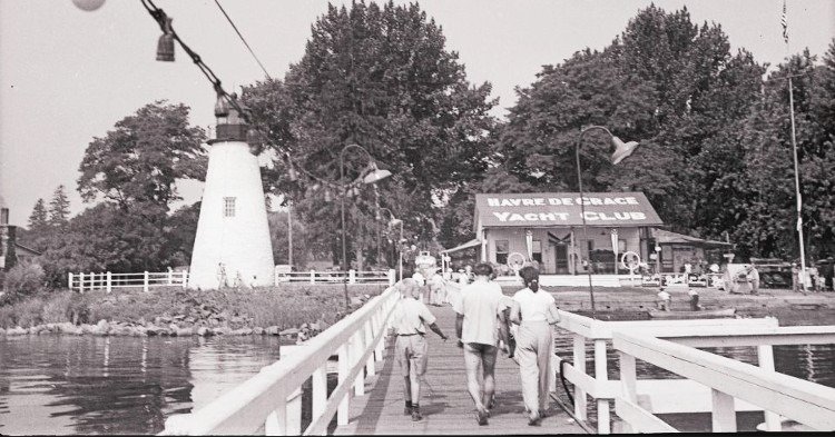 The Concord Point Lighthouse and the Havre de Grace Yacht Club building and pier