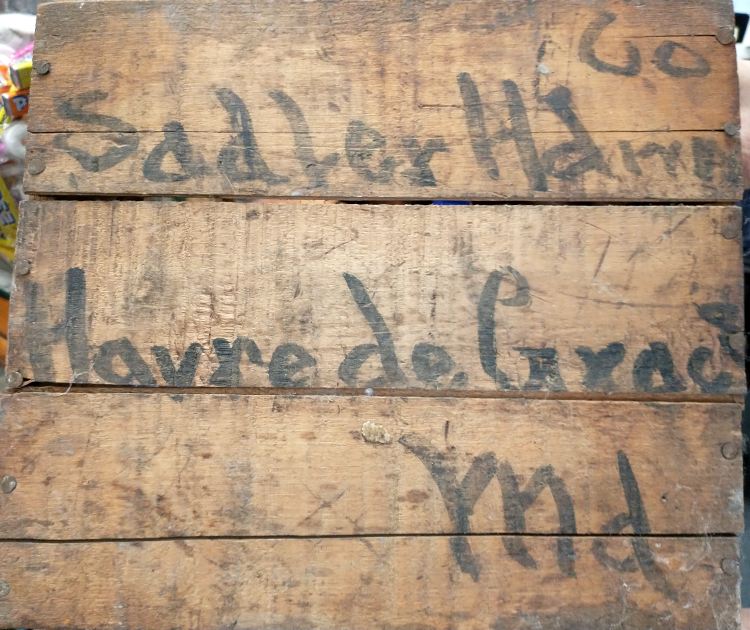 image of a wooden crate from Sadler's Hardware in Havre de Grace