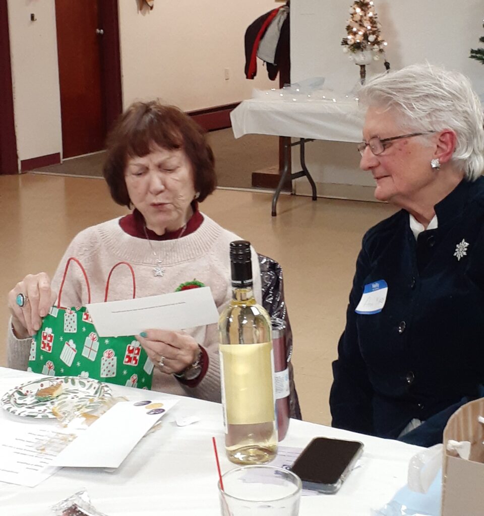 Kathryn Hill on left at the 2022 Soroptimists of Havre de Grace Christmas Party.