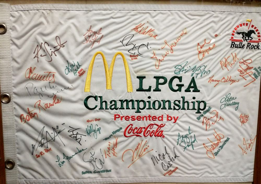 A small banner donated to Havre de Grace History MuZeum by one of the drivers for the McDonalds LPGA Championship - presented by Coca-Cola, at Bulle Rock - with more than 2 dozen signatures.
