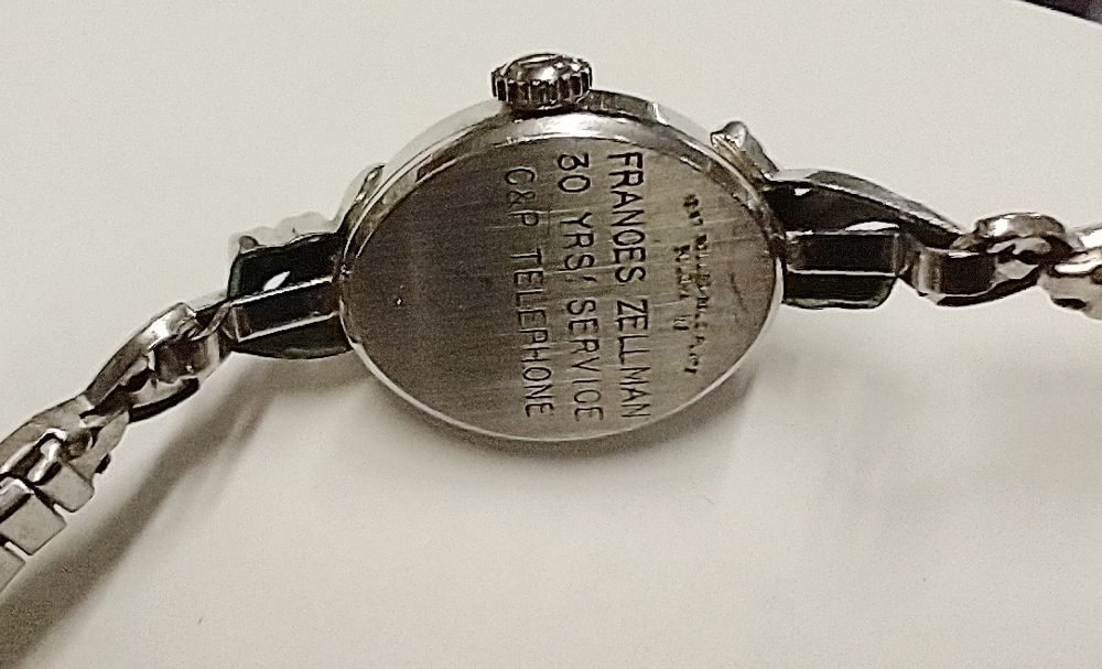 Inscription on the beautiful silver watch reads "Frances Zellman 30 yrs of service C&P Telephone Co."