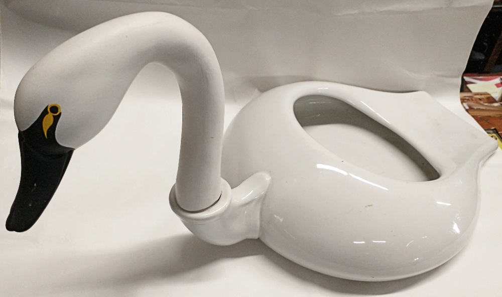 another view of our casual historian's prized piece, his porcelain-wood swan decoy - beautiful swan head and neck by Jim McMillan