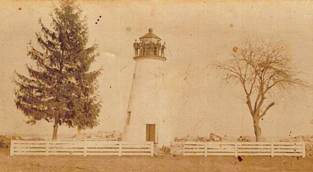 Concord Point Lighthouse, in 1890s. Wonder who the six men were standing on the lantern deck.